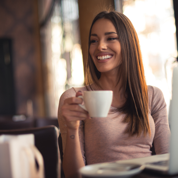 A woman with a flower in her hair.