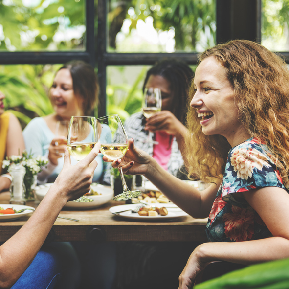 A man standing in front of a red circle.